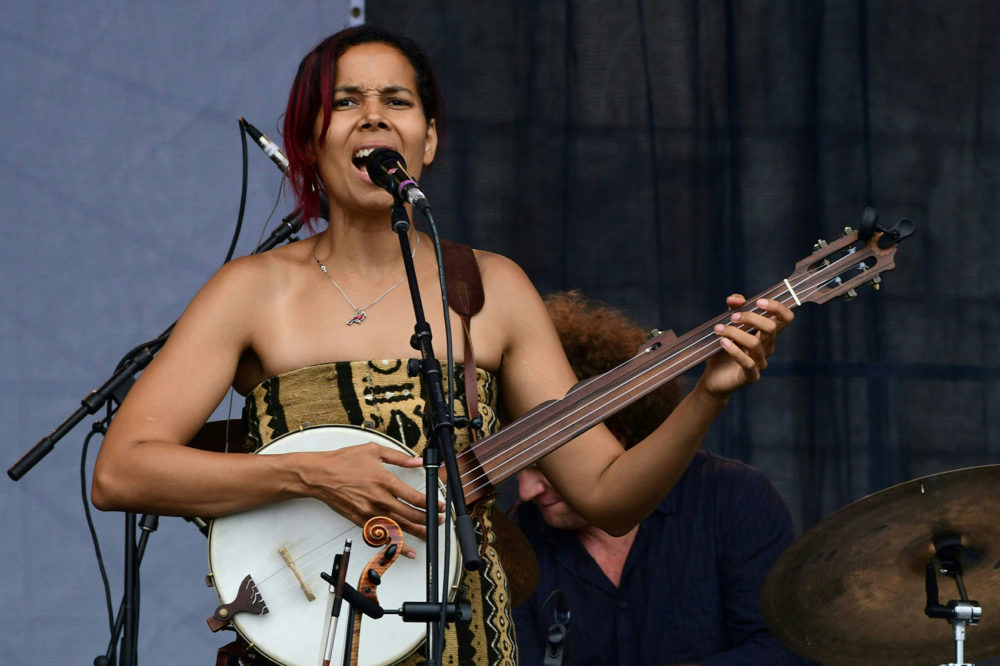 Vocalist Rhiannon Giddens performs with Dirk Powell, Hubby Jenkins, Jason Sypher and Jamie Dick at the Newport Jazz Festival, August 5, 2017 in Newport, R.I. (Eva Hambach/AFP/Getty Images)