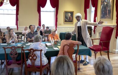 Stephen Sampson plays Prince Hall at a performance of &quot;The Petition&quot; at the Old State House. (Robin Lubbock/WBUR)