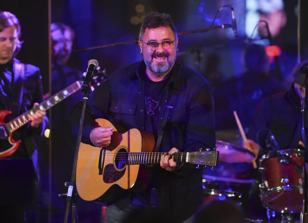 Musician Vince Gill performs at the Facing Addiction with NCADD gala at the Rainbow Room on Monday, Oct. 8, 2018, in New York. (Evan Agostini/Invision/AP)