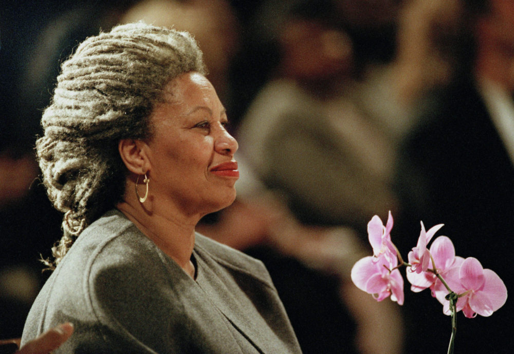 In this April 5, 1994 file photo, Toni Morrison holds an orchid at the Cathedral of St. John the Divine in New York. The Nobel Prize-winning author has died. (Kathy Willens/AP File Photo)