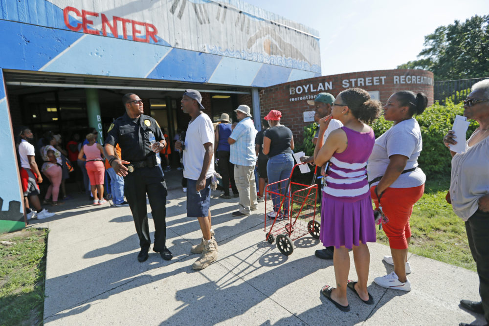 A line forms in front of the Bolan Street Recreation center as Newark residents picked up cases of bottled water, Monday, Aug. 12, 2019, in Newark, N.J., after U.S. Environmental Protection Agency revealed that recent tests showed elevated lead levels in drinking water in a few locations despite filters that had been distributed earlier. The EPA warned that &quot;out of an abundance of caution&quot; residents should use bottled water for drinking and cooking. People exiting the facility said they had waited two to three hours for the water. (Kathy Willens/AP)