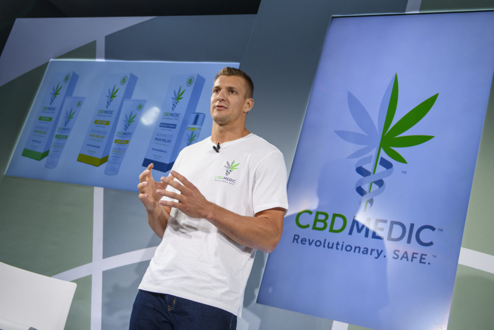 Former New England Patriots tight end Rob Gronkowski holds a news conference announcing his advocacy for CBD and becoming an investor in Abacus Health Products. (AP Photo/Corey Sipkin)