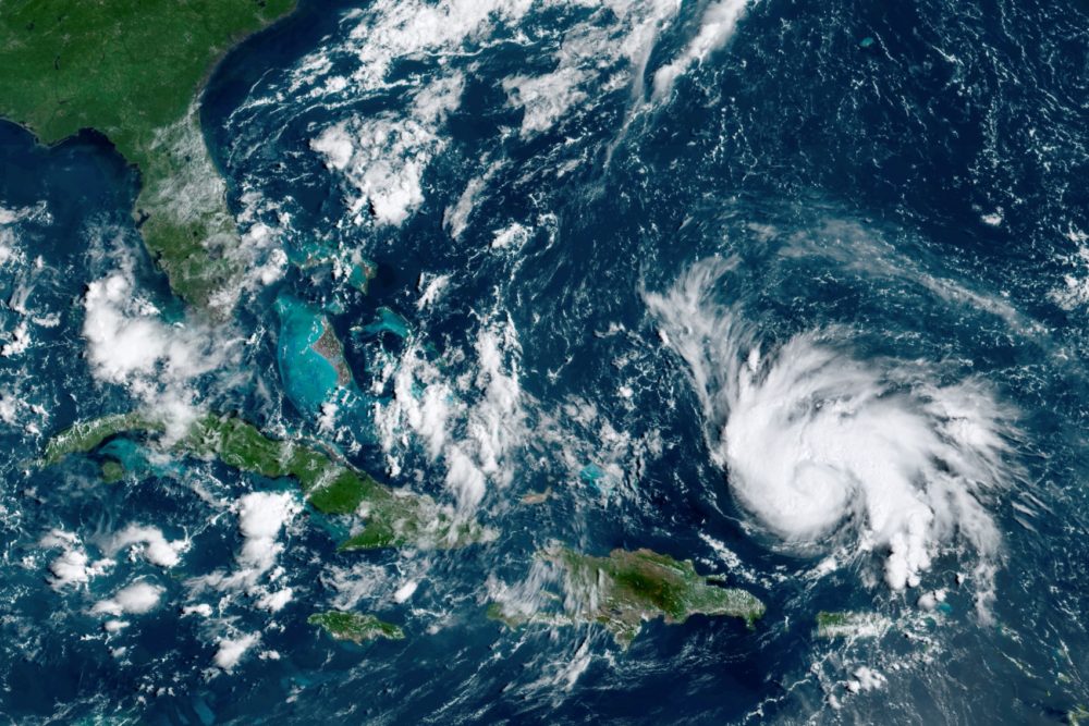 This satellite image, taken Thursday, Aug. 29, 2019, shows Hurricane Dorian moving over open waters of the Atlantic Ocean. (NOAA via AP)