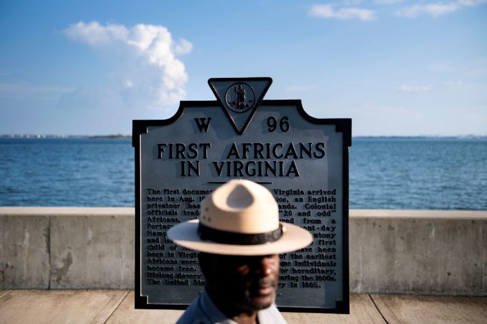 Superintendent of Fort Monroe National Monument, Terry E. Brown, poses near a historical marker at the fort, August 19, 2019, in Hampton, Virginia. (Brendan Smialowski/AFP/Getty Images)