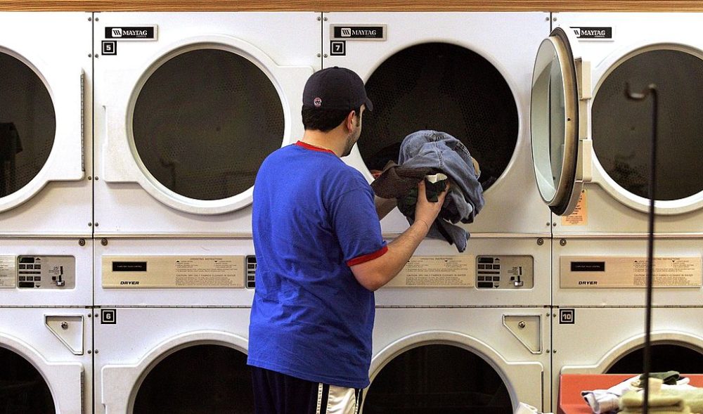 A man at a Maytag laundromat in Mount Prospect, Illinois. (Tim Boyle/Getty Images)