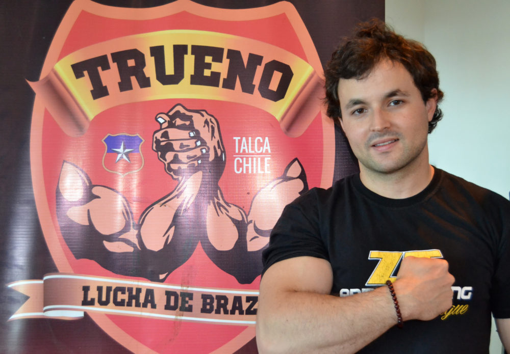 Tomás Silva at an arm wrestling competition in Talca, Chile. (Paige Sutherland for WBUR)