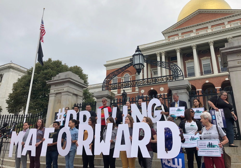Proponents of driver's licenses for undocumented immigrants rallied in front of the State House on Wednesday morning ahead of a hearing on the proposal. [Photo: Colin A. Young/SHNS]