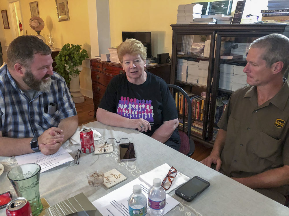 From left to right, Ted Figlock, Annemarie Matulis and Steven Palm at a support group meeting in Taunton. (Lynn Jolicoeur/WBUR)
