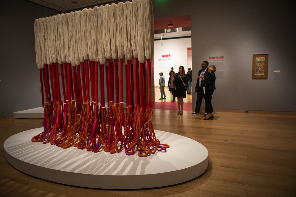 Sheila Hicks’ fiber art piece “Bamian” is on display as part of the “Women Take the Floor” exhibit at the Museum of Fine Arts. (Jesse Costa/WBUR)
