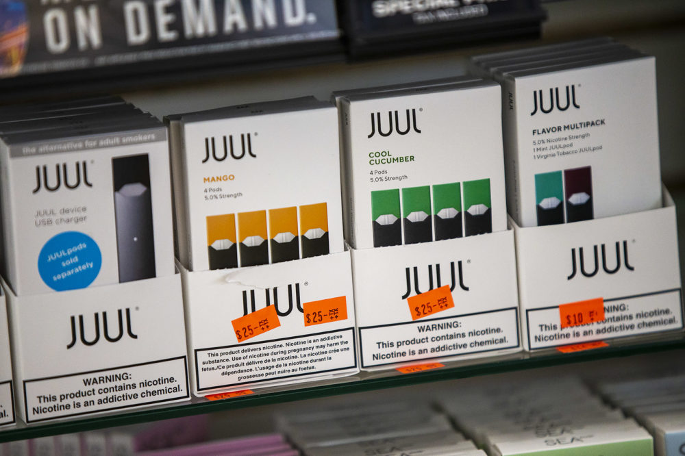 Various Juul products are on display at Fast Eddie's Smoke Shop in Allston. (Jesse Costa/WBUR)