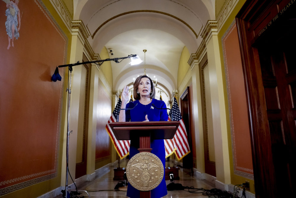 House Speaker Nancy Pelosi reads a statement announcing a formal impeachment inquiry into President Trump. (Andrew Harnik/AP)