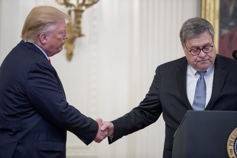 In this Sept. 9, 2019 photo, President Donald Trump shakes hands with Attorney General William Barr. (Andrew Harnik/AP)