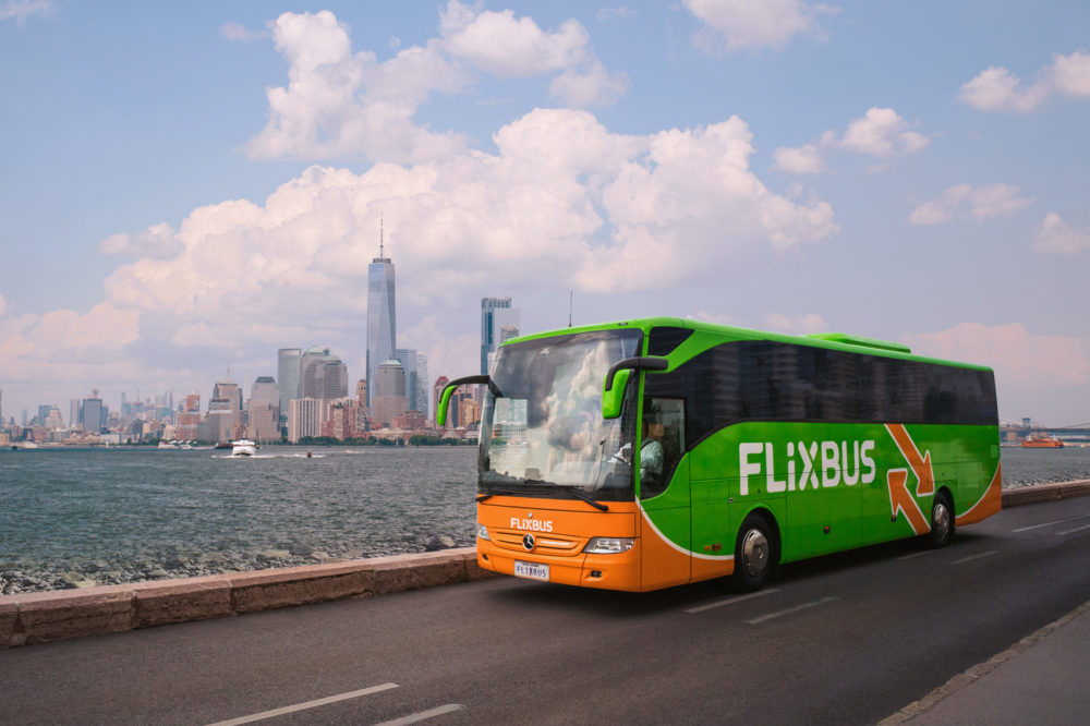A promotional image shows a Flixbus vehicle superimposed against the New York City skyline. (Courtesy of Flixbus)