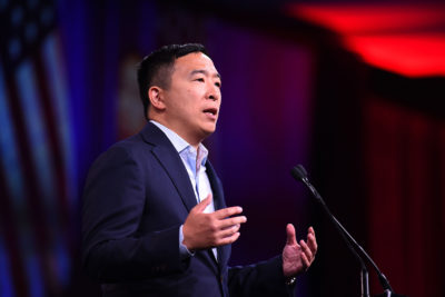 2020 U.S. Democratic Presidential hopeful Andrew Yang speaks on-stage during the Democratic National Committee's summer meeting in San Francisco, Calif., on August 23, 2019. (Josh Edelson/AFP/Getty Images)