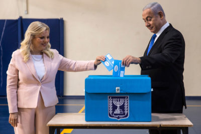 Israeli Prime Minister Benjamin Netanyahu and his wife Sara cast their votes at a voting station in Jerusalem on Sept. 17, 2019. (Heidi Levine/AFP/Getty Images)