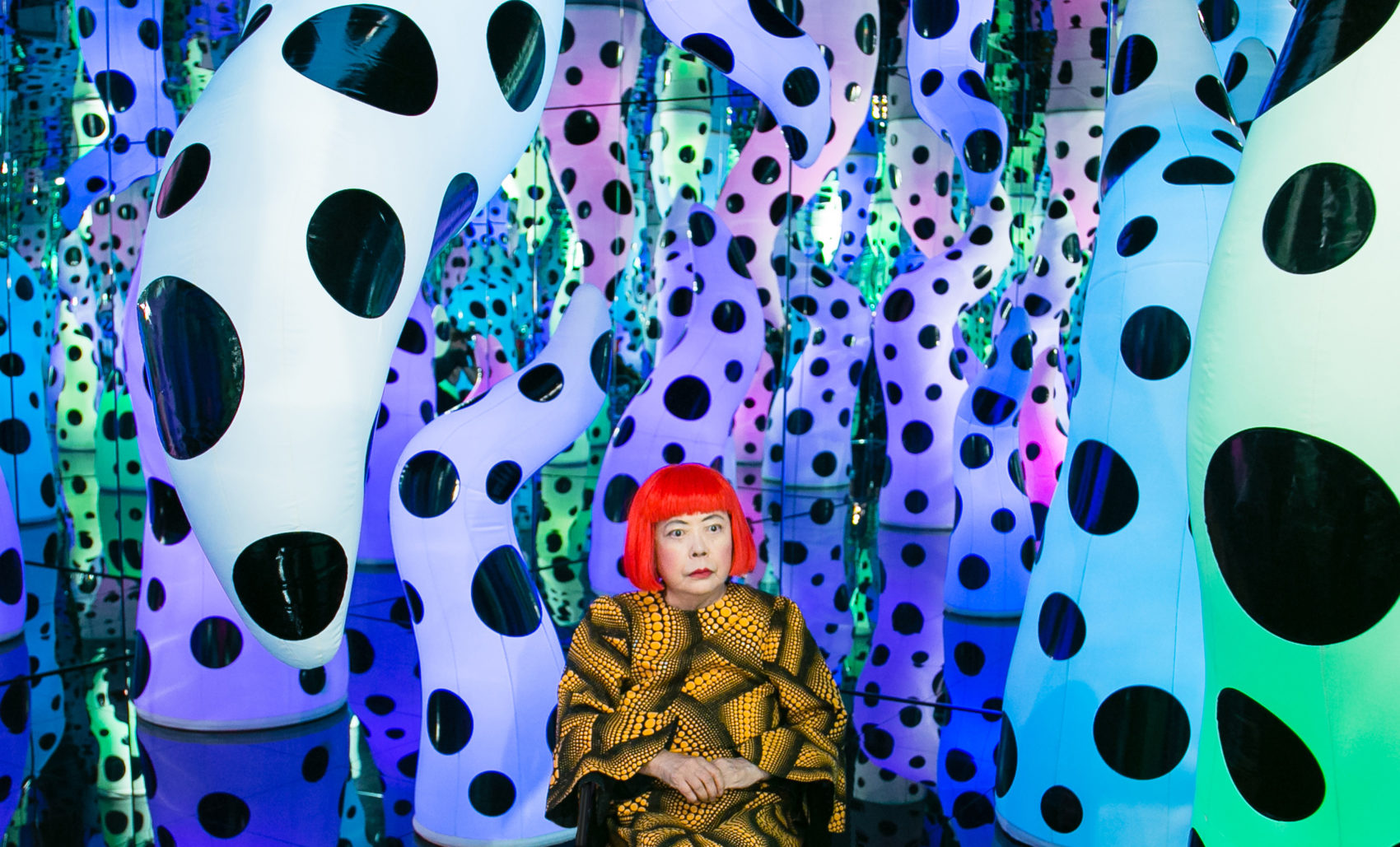 Yayoi Kusama pictured with her work &quot;Love Is Calling,&quot; during her solo exhibition &quot;I Who Have Arrived In Heaven&quot; at David Zwirner, New York in 2013. (Courtesy David Zwirner, New York; Ota Fine Arts, Tokyo/Singapore/Shanghai; Victoria Miro, London/Venice)