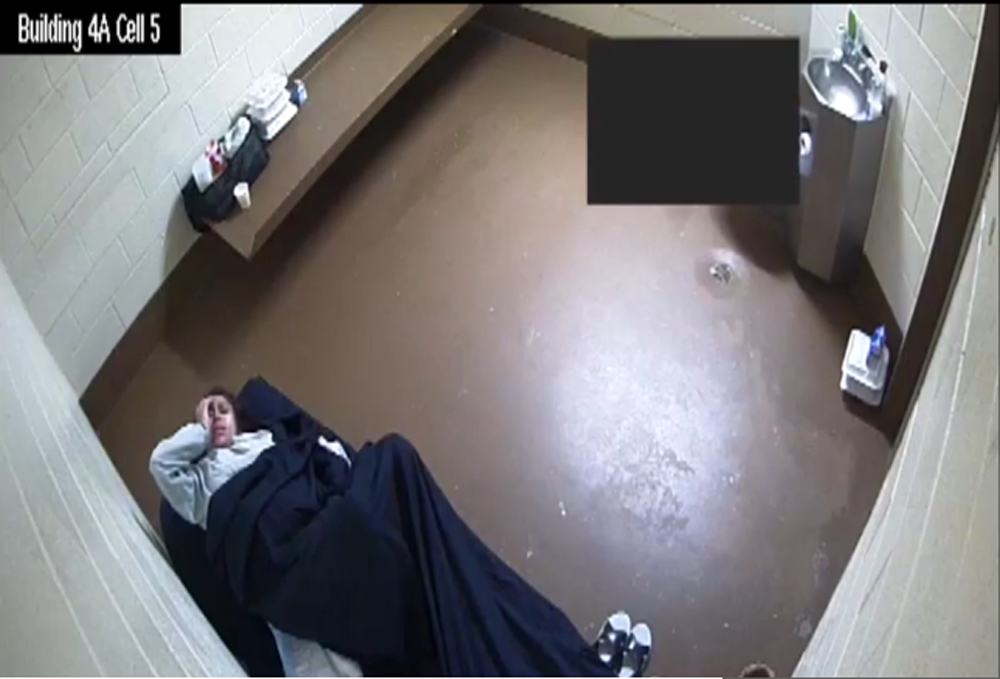 A screen grab from video footage which shows Diana Sanchez before and during giving birth alone in a jail cell. (Courtesy of Mari Newman, Sanchez’s attorney)