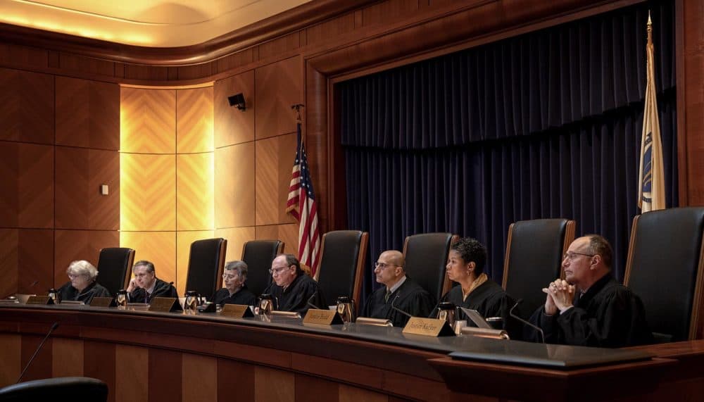 The justices of the Massachusetts Supreme Judicial Court hear a case in May 2019. (Robin Lubbock/WBUR)
