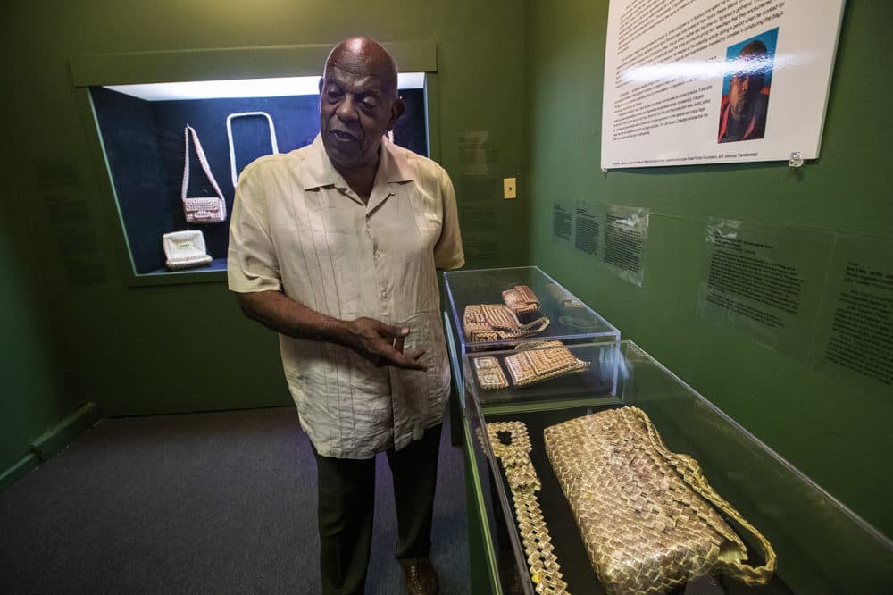 Edmund Barry Gaither, the Director and Curator of the Museum of the National Center of Afro-American Artists, speaks about the exquisite craft that went into the pieces in the &quot;Inmate Ingenuity: The Cell Solace exhibit&quot; at the Museum of NCAAA. (Jesse Costa/WBUR)