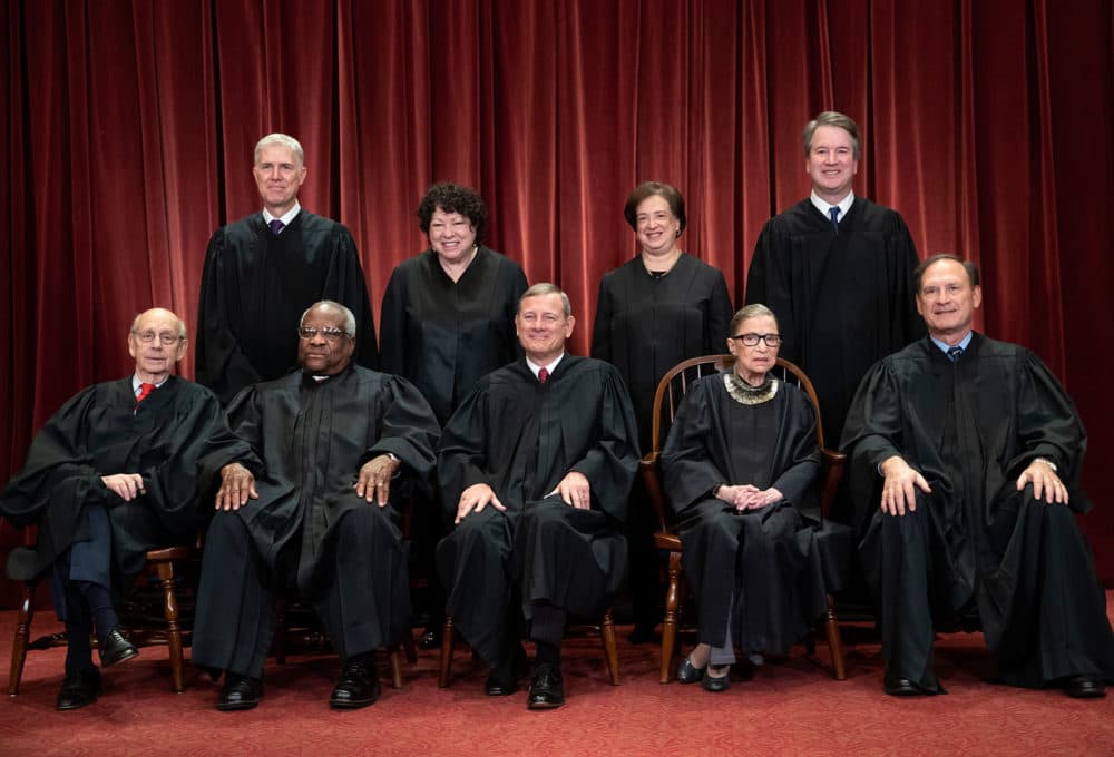 In this 2018 file photo, the justices of the U.S. Supreme Court gather for a formal group portrait. (J. Scott Applewhite/AP)