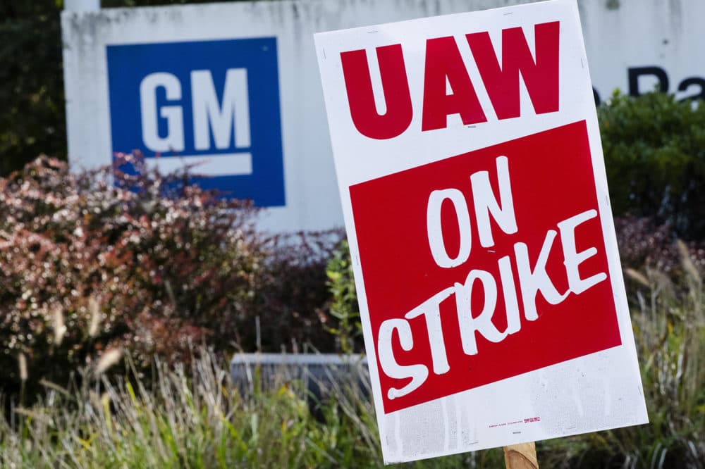 In this Sept. 23, 2019, file photo a sign is posted during a demonstration outside a General Motors facility in Langhorne, Pa. (Matt Rourke, File/AP)