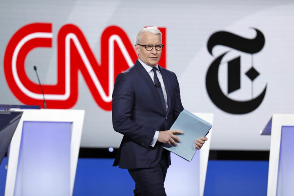 Anderson Cooper, CNN anchor, walks onstage for a Democratic presidential primary debate hosted by CNN/New York Times at Otterbein University, Tuesday, Oct. 15, 2019, in Westerville, Ohio. (John Minchillo/AP)