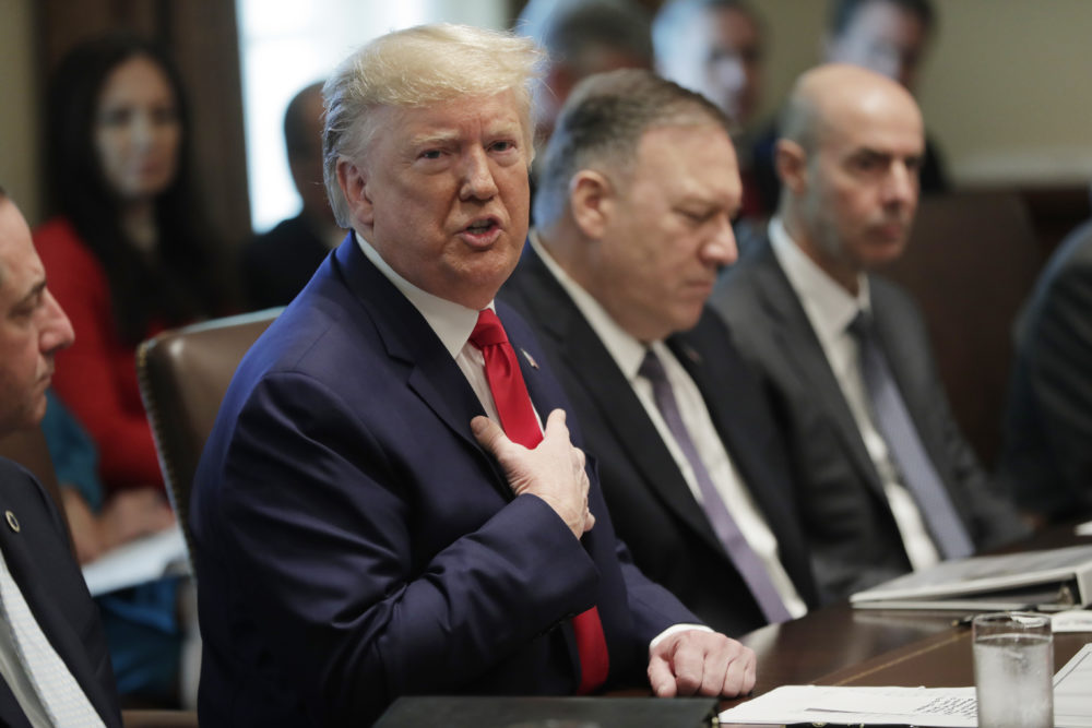 President Trump speaks during a Cabinet meeting in the White House, Monday, Oct. 21, 2019. Secretary of State Mike Pompeo is right of the President. (Pablo Martinez Monsivais/AP)