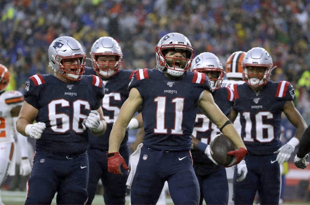 Patriots wide receiver Julian Edelman, center, celebrated a touchdown at Gillette Stadium last season. (Steven Senne/AP)