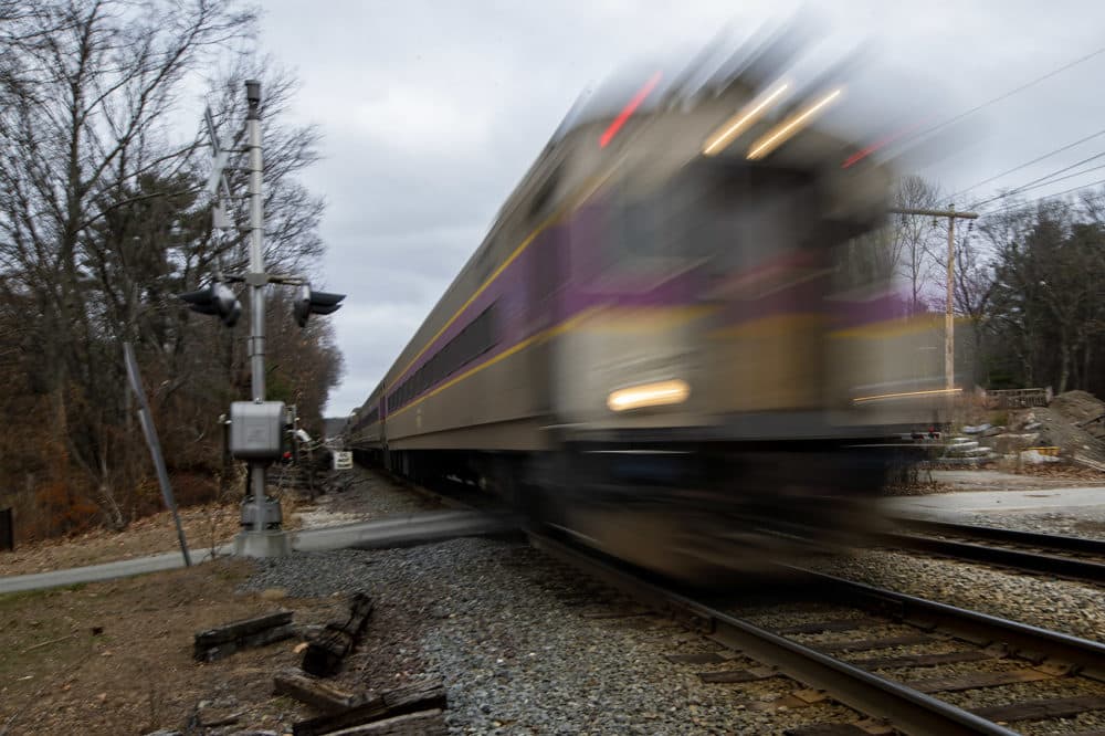 An MBTA Commuter Rail train on the Haverhill line travels through Andover. (Jesse Costa/WBUR)