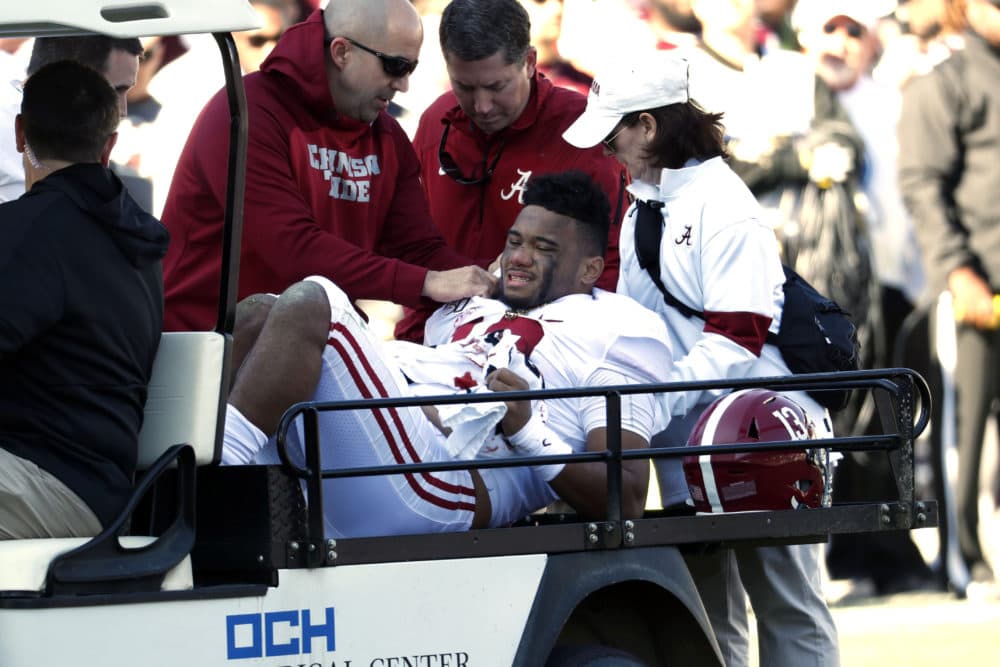 Alabama quarterback Tua Tagovailoa is carted off the field after his injury in the first half of last Saturday's game against Mississippi State. (Rogelio V. Solis/AP)