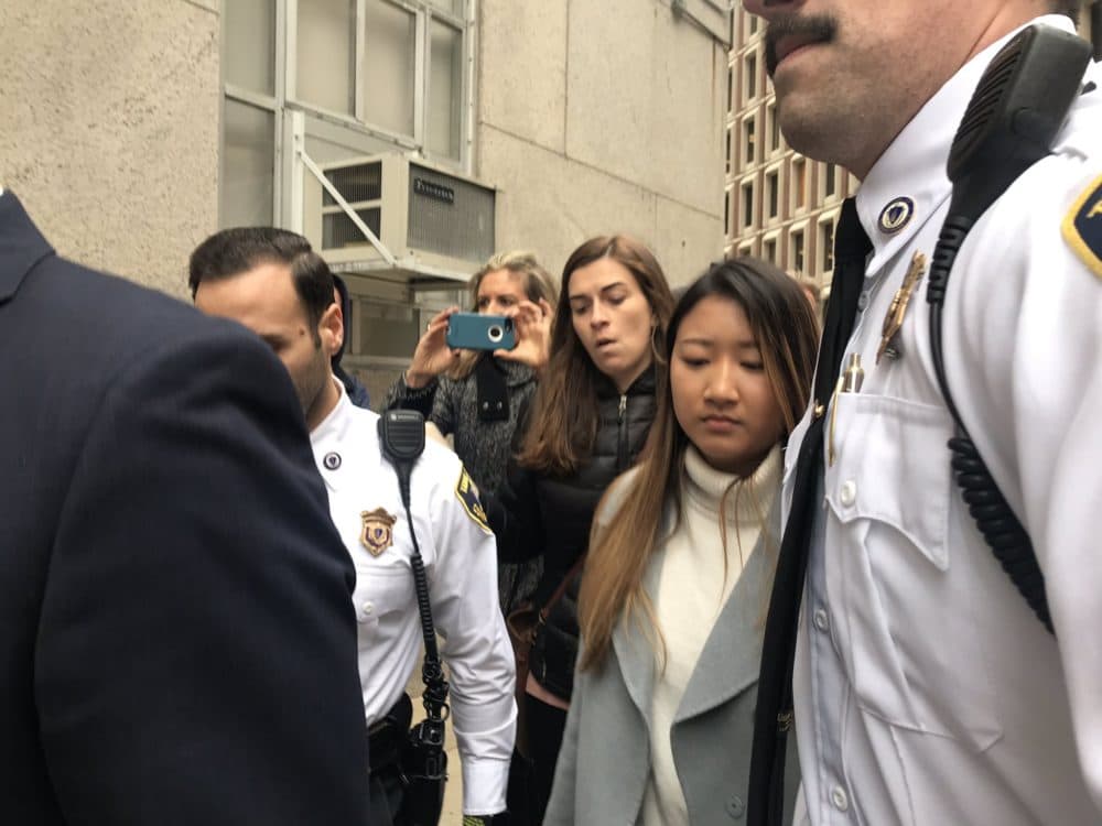 Former Boston College student Inyoung Yu enters a Boston courthouse, in November 2019. (Quincy Walters/WBUR)