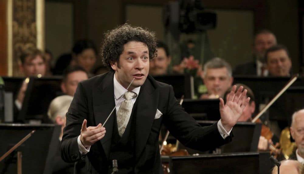 Maestro Gustavo Dudamel of Venezuela, left, conducts the Vienna Philharmonic Orchestra during the traditional New Year’s Concert at the Golden Hall of the Musikverein in Vienna, Austria, Sunday, Jan. 1, 2017. (AP Photo/Ronald Zak)