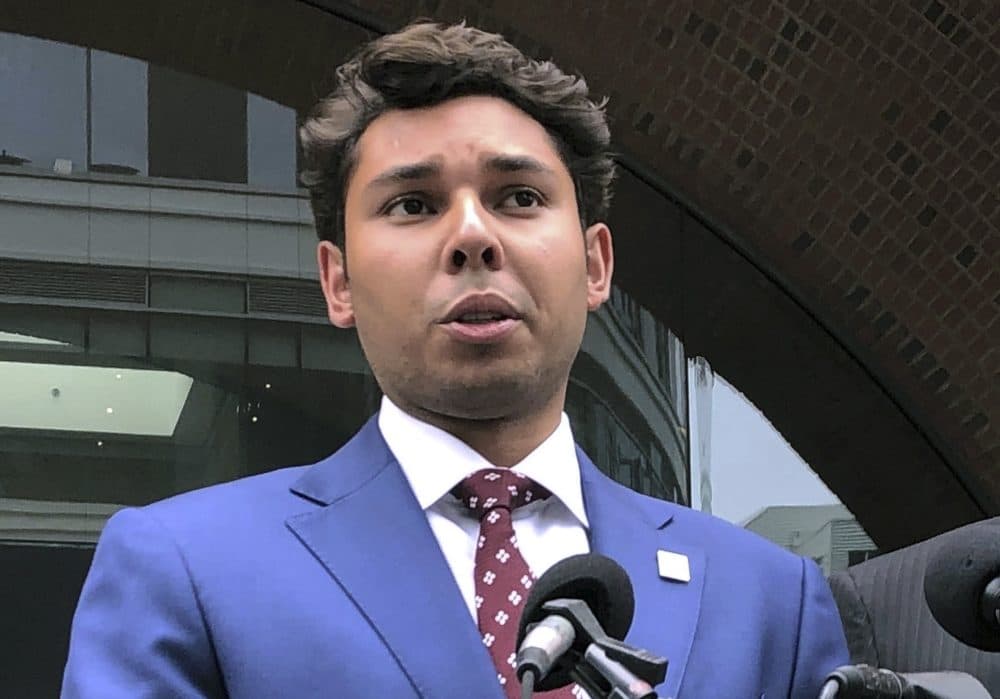 In this Sept. 6, 2019 file photo, Fall River Mayor Jasiel Correia, left, speaks outside the federal courthouse in Boston after his appearance on bribery, extortion and fraud charges. (Philip Marcelo/AP)
