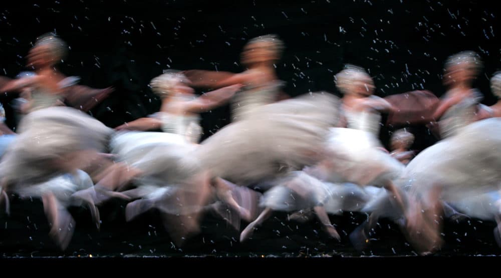 Members of the Corps de Ballet of the Royal Ballet dance as snowflakes in the Land of the Snow scene, during a final dress rehearsal of the Nutcracker Ballet at the Royal Opera House in London, Monday Dec. 5, 2005. (Alastair Grant/AP)
