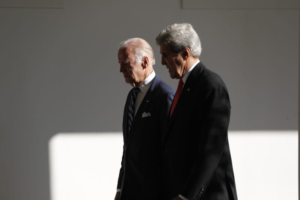 Secretary of State John Kerry and Vice President Joe Biden walk during a state arrival ceremony,in 2016. (Pablo Martinez Monsivais/AP)