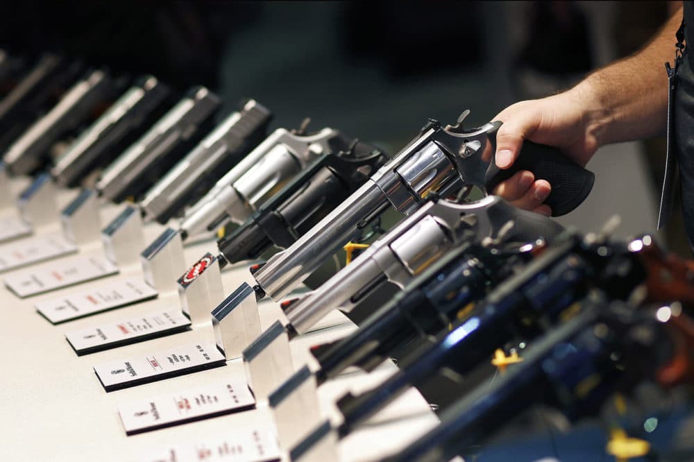 In this Jan. 19, 2016 file photo, handguns are displayed at the Smith & Wesson booth at the Shooting, Hunting and Outdoor Trade Show in Las Vegas. (John Locher, File/AP)