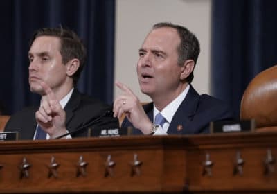 House Intelligence Committee Chairman Adam Schiff, D-Calif., with committee staffer Daniel Noble at left, delivers his closing remarks at the end of a week of public impeachment hearings in Washington on Thursday, Nov. 21, 2019. (J. Scott Applewhite/AP)