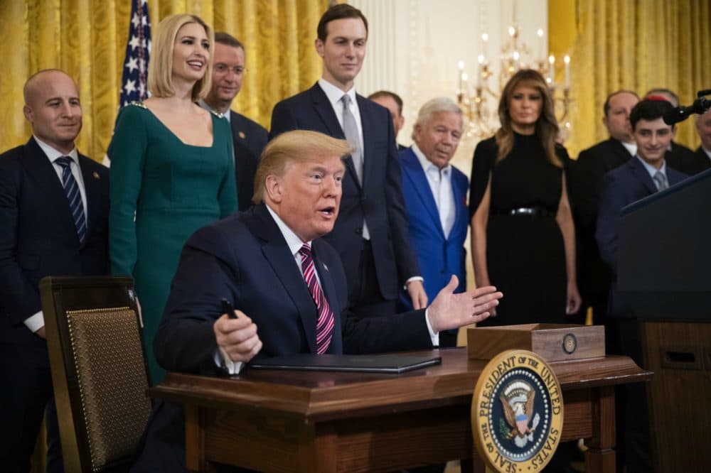 President Trump gestures before signing an executive order that will broaden Title VI of the 1964 Civil Rights Act to apply to discrimination based on anti-Semitism.  (Manuel Balce Ceneta/AP)