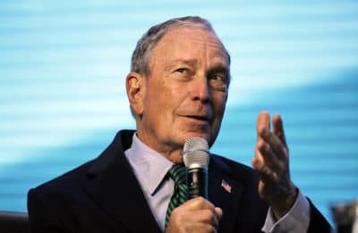 Democratic Presidential candidate and former New York City Mayor Michael Bloomberg gestures while taking part in an on-stage conversation with former California Gov. Jerry Brown in San Francisco on Dec. 11, 2019 (Eric Risberg/AP)