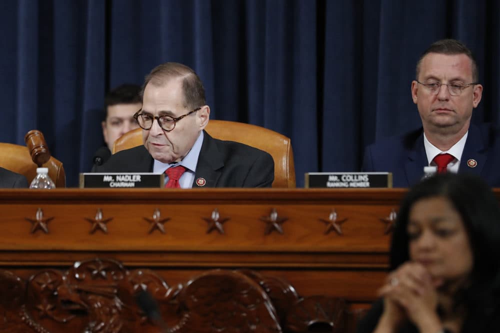 House Judiciary Committee Chairman Rep. Jerrold Nadler, D-N.Y., left, gavels the hearing to a close after the House Judiciary Committee voted on the articles of impeachment against President Donald Trump, Friday, Dec. 13, 2019, on Capitol Hill in Washington. House Judiciary Committee ranking member Rep. Doug Collins, R-Ga., is right. (Andrew Harnik/AP)