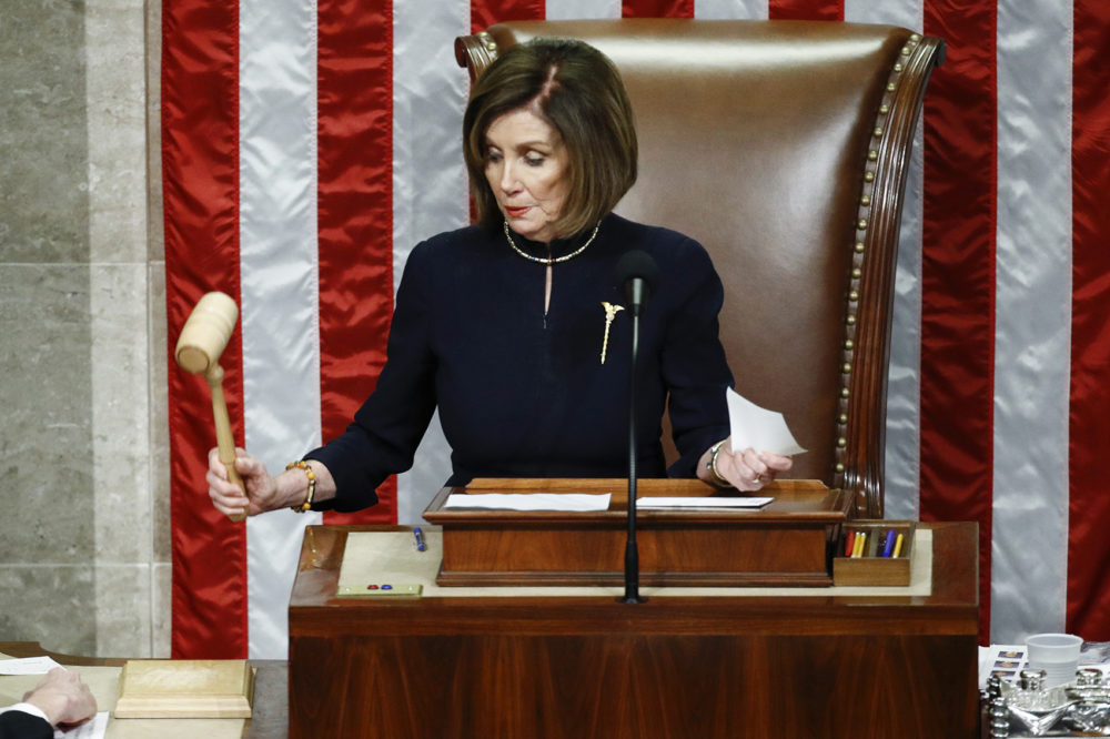 House Speaker Nancy Pelosi of Calif., strikes the gavel after announcing the passage of article II of impeachment against President Donald Trump, Wednesday, Dec. 18, 2019, on Capitol Hill in Washington. (Patrick Semansky/AP)