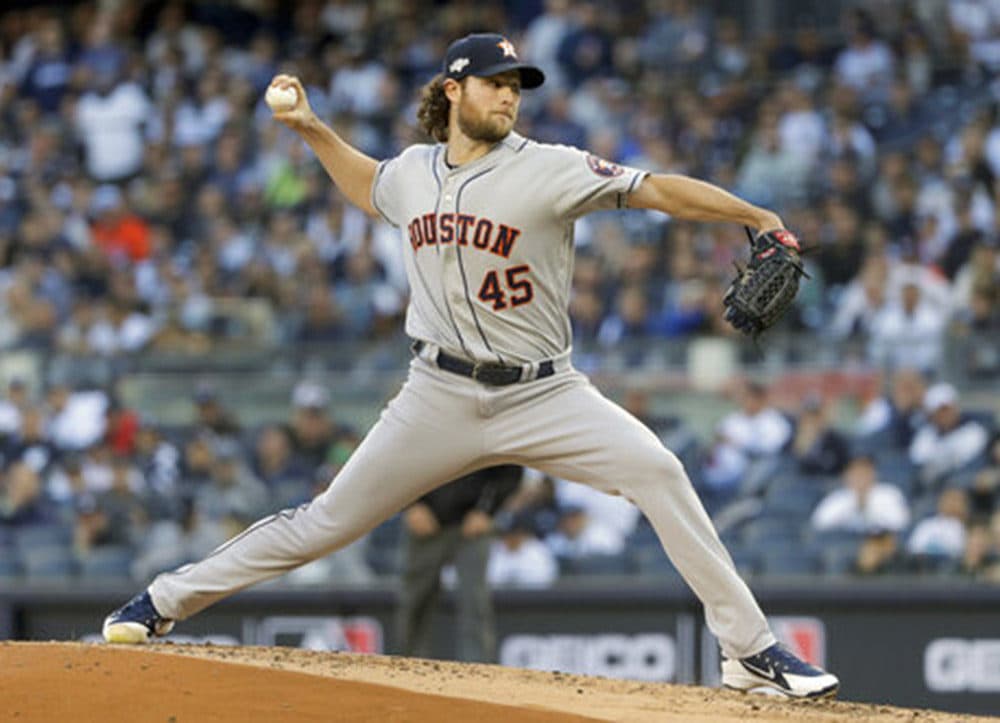 Then Houston Astros starter pitcher Gerrit Cole pitches against the New York Yankees during the 2019 MLB playoffs. The Yankees landed the biggest prize of the free agent market, adding Gerrit Cole to their rotation with a record $324 million, nine-year contract. (Frank Franklin II/AP)