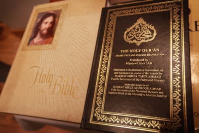 A copy of the Quran is displayed with a bible in the library of the Baitul Futuh Mosque in Morden on Sept. 10, 2010 south of London, England. (Peter Macdiarmid/Getty Images)
