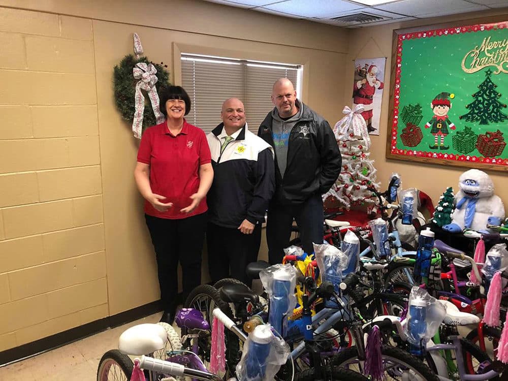 Bob Charland (right) just finished building 25 bikes that he plans to donate for Christmas. (Courtesy Bob Charland)
