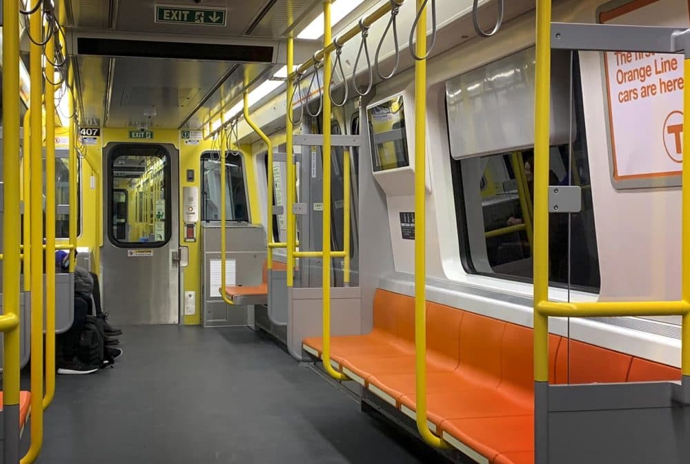 The bright interior of one of the new Orange Line cars. (Steve Brown/WBUR)