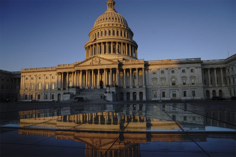 The Capitol is seen at sunrise. (J. Scott Applewhite/AP)