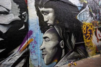 A mural of Kobe Bryant and his daughter, Gianna, at Graffiti Alley in Central Square, by artist Brandalizm. (Robin Lubbock/WBUR)