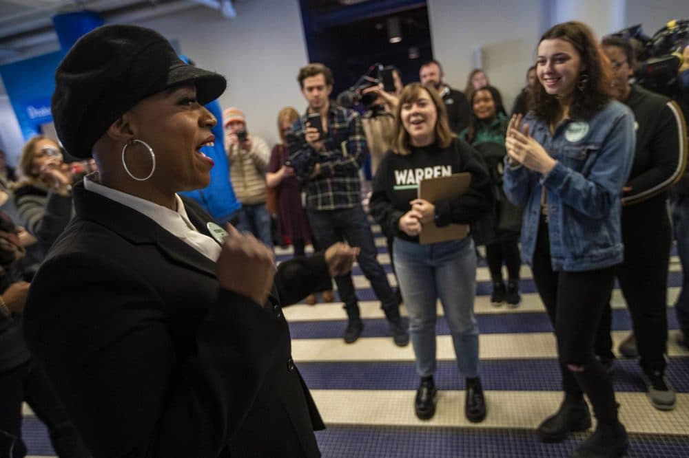 Congresswoman Ayanna Pressley pumps up a group of student canvassers during an an Elizabeth Warren campaign event at the Drake University Student Center in Des Moines, Iowa. (Jesse Costa/WBUR)