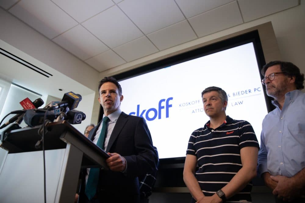 Josh Koskoff, attorney for nine families suing gun manufacturer Remington Arms Co., speaks at a 2019 press conference. Ian Hockley’s son and Bill Sherlach’s wife were killed in the 2012 Sandy Hook Elementary School Shooting. (Ryan Caron King / Connecticut Public Radio)
