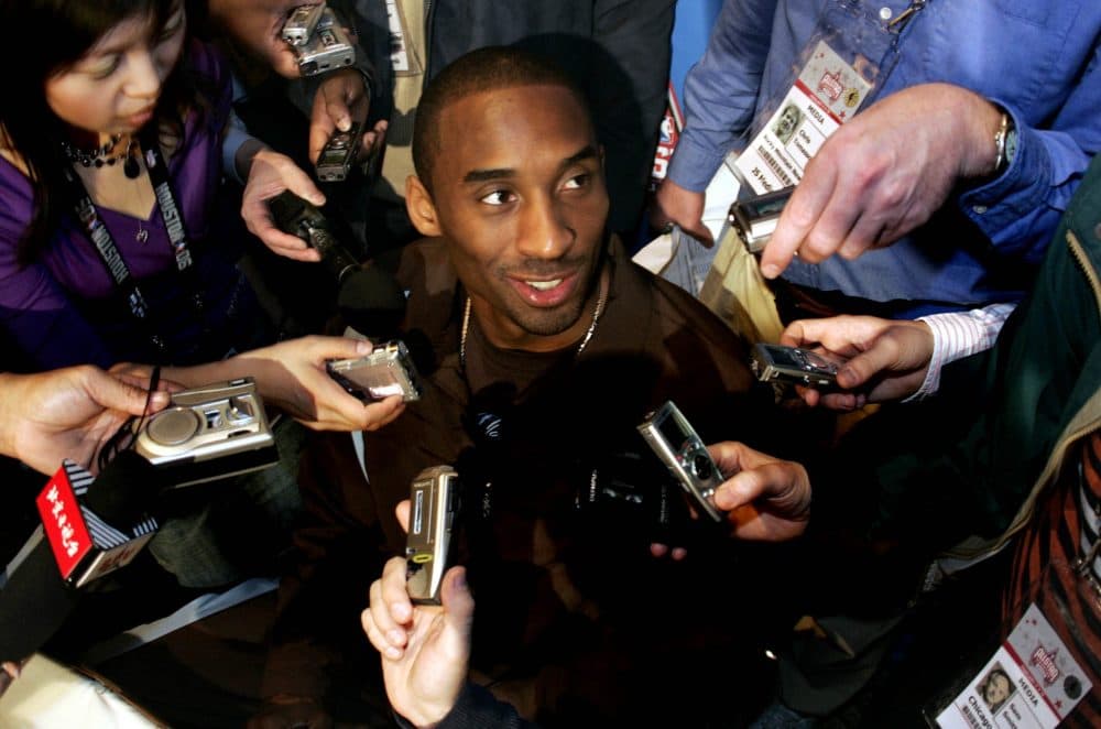 Los Angeles Lakers' Kobe Bryant answers reporters questions during the NBA All Star basketball availability in Houston in 2006. (LM Otero/AP)